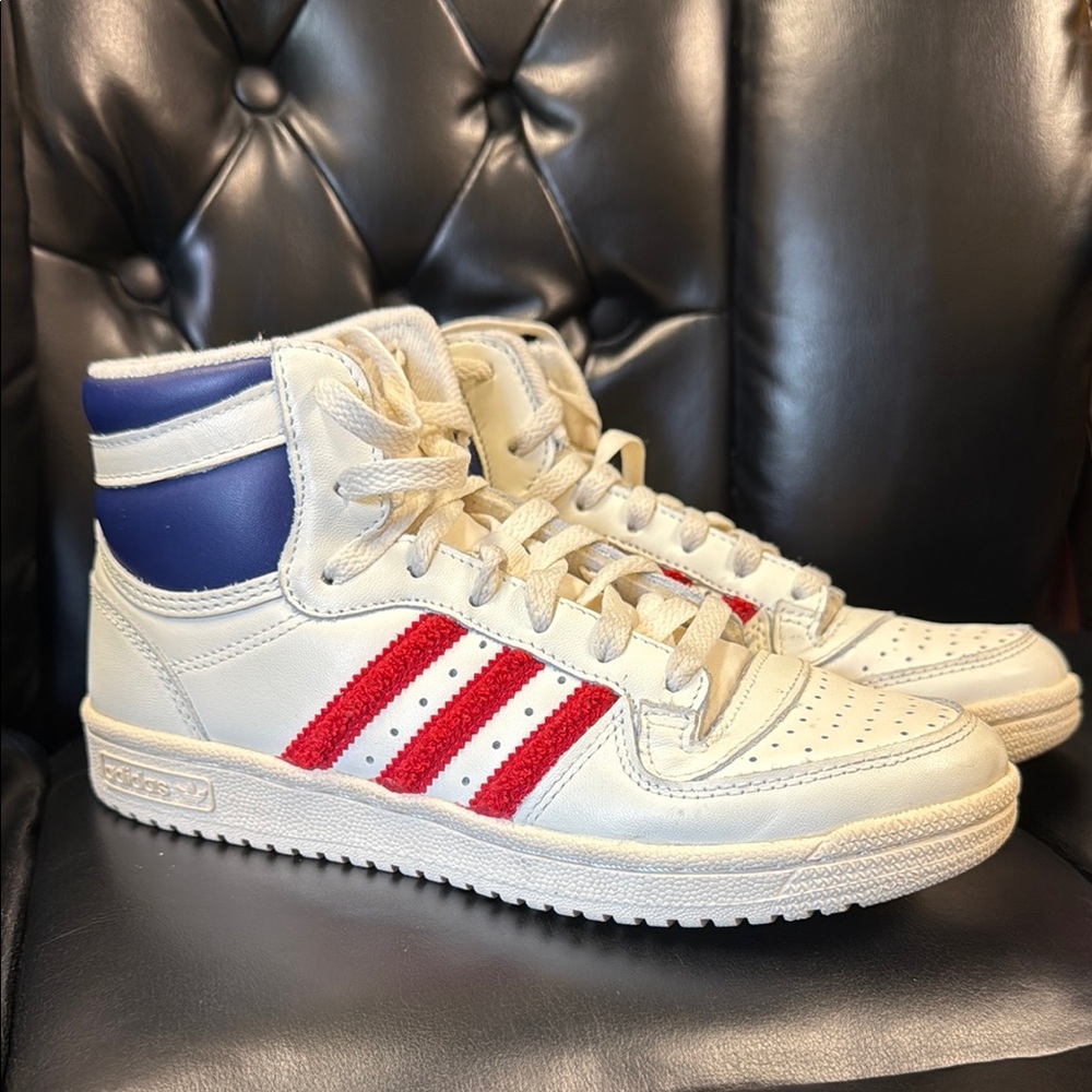 Adidas Cream, Red, and Blue High-Top Sneakers.